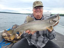 Successful angler with a large lake trout in WI