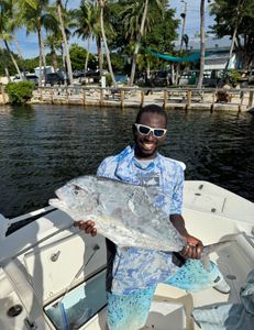 Photograph of a 22-inch African Pompano fish caught while fishing in Key Largo