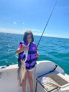 A single angler fishing at the scenic location of Key Largo