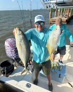 Two blue runner fish caught in Key Largo