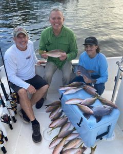 2 fish caught in FL by 3 people fishing