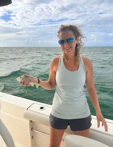 A person fishing with a rod in Key Largo