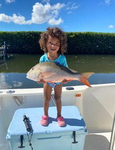Angler holding a fish in Key Largo