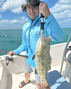 A lone angler fishing in the waters of Key Largo