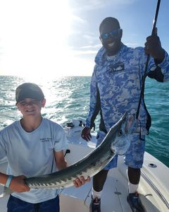 Two people fishing in FL