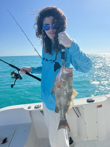 "Tranquil Catch: A serene day on the open sea, with a bountiful fishing expedition."