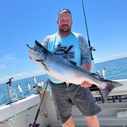 A Chinook Salmon, a large fish, caught while fishing in NY.