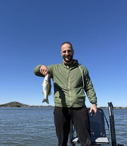 A lone angler fishing at Buchanan Dam
