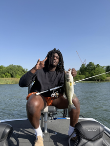 Reeled in a massive Florida Bass after a hard-fought battle in the Texas heat!