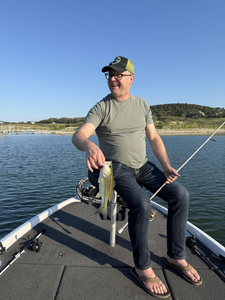 Hooked a monster Largemouth Bass at Buchanan Dam, TX - perfect day for fishing!
