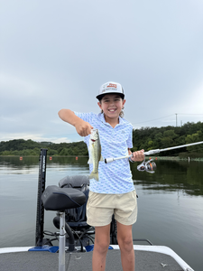 Reeling in a Largemouth Bass on a rainy day at Buchanan Dam!