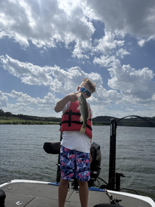 Reeling in a huge Largemouth Bass at Buchanan Dam - fishing at its best!