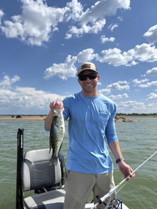 Hooked a tasty white crappie during the partly cloudy day at Buchanan Dam TX.