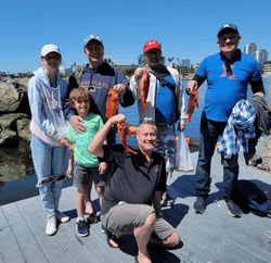Group of 7 people in Long Beach enjoying fishing