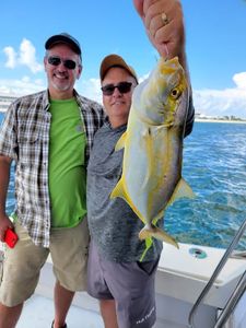 A picture of two people fishing in FL