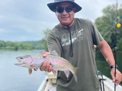 Angler with rainbow trout in Missouri