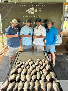 Four friends fishing together in LA