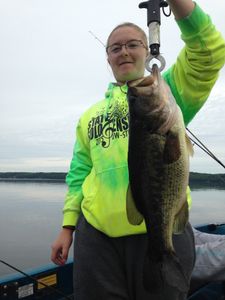 Angler holding a 26-inch fish in Phelps