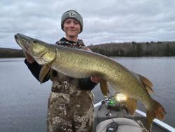 Angler holds a muskellunge fish in WI