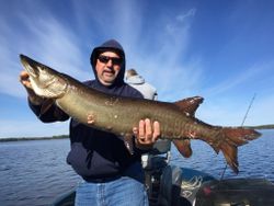 Angler with big 39-inch fish caught while fishing in WI