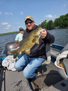 Two people fishing in Phelps