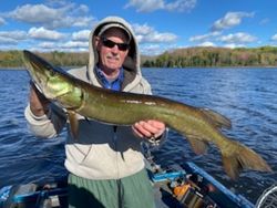 A person fishing in the waters of Wisconsin