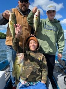Three people fishing in Phelps