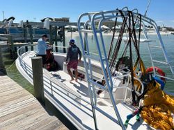 Two people fishing in Gulf Shores