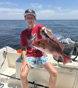 Man fishing on the beach in Gulf Shores