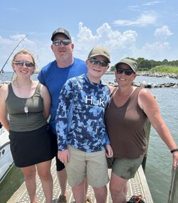 4 people fishing in the Gulf Shores