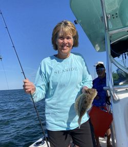 Two people fishing in Gulf Shores