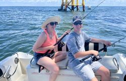 Two people fishing in Gulf Shores