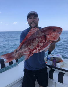 Lone angler fishing in Gulf Shores