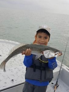 Two anglers with a big fish in TX