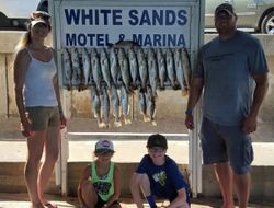 4 people fishing in TX