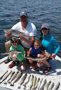 Three fishing at Port Isabel