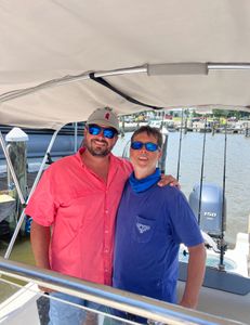 Two anglers enjoying a fishing trip in Pass Christian
