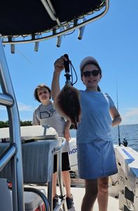 Two people fishing in GA