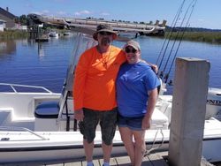 Two people enjoying a fishing trip in Savannah