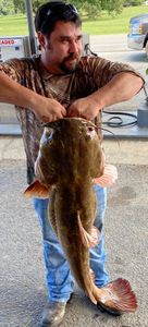 Angler holding a 24-inch fish in GA