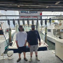 Two anglers enjoying a fishing trip in FL