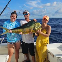 Three anglers fishing on the coast of Florida