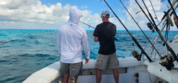 Fishing the waters off Islamorada under cloudy skies.