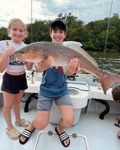 Two people fishing in FL
