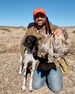 Successful bird hunt with a loyal companion.