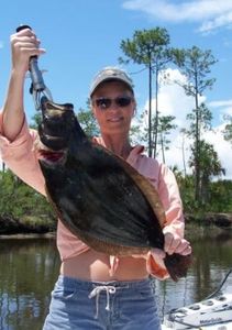 A person enjoying a fishing trip in Jacksonville