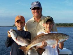 Two redfish, 24 inches long, caught in Jacksonville