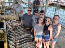 Group of six people fishing in OK