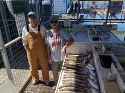 Two people fishing in Kingston