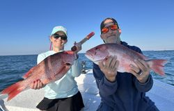 Two grey snappers fishing in AL